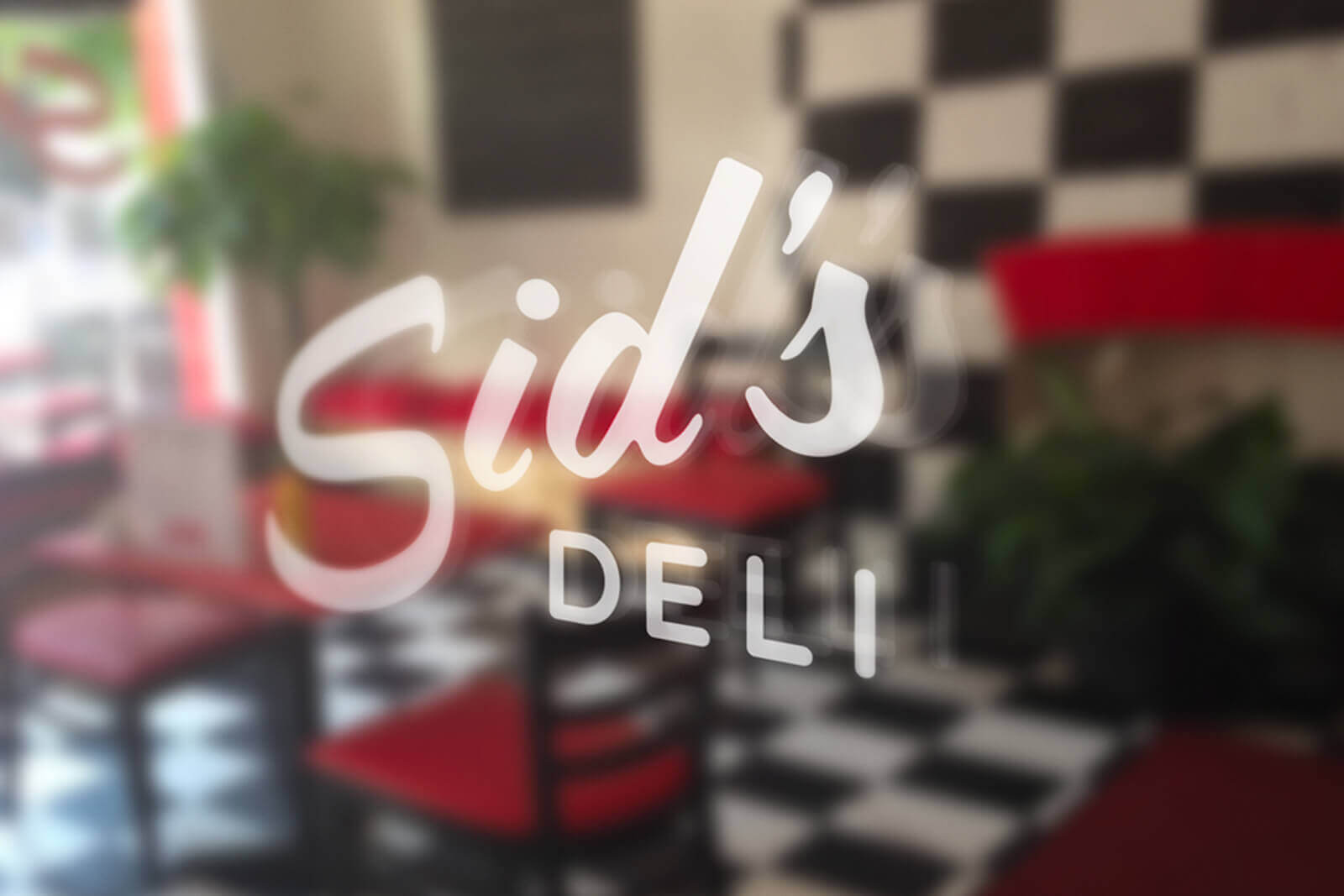 A window decal with Sid's logo