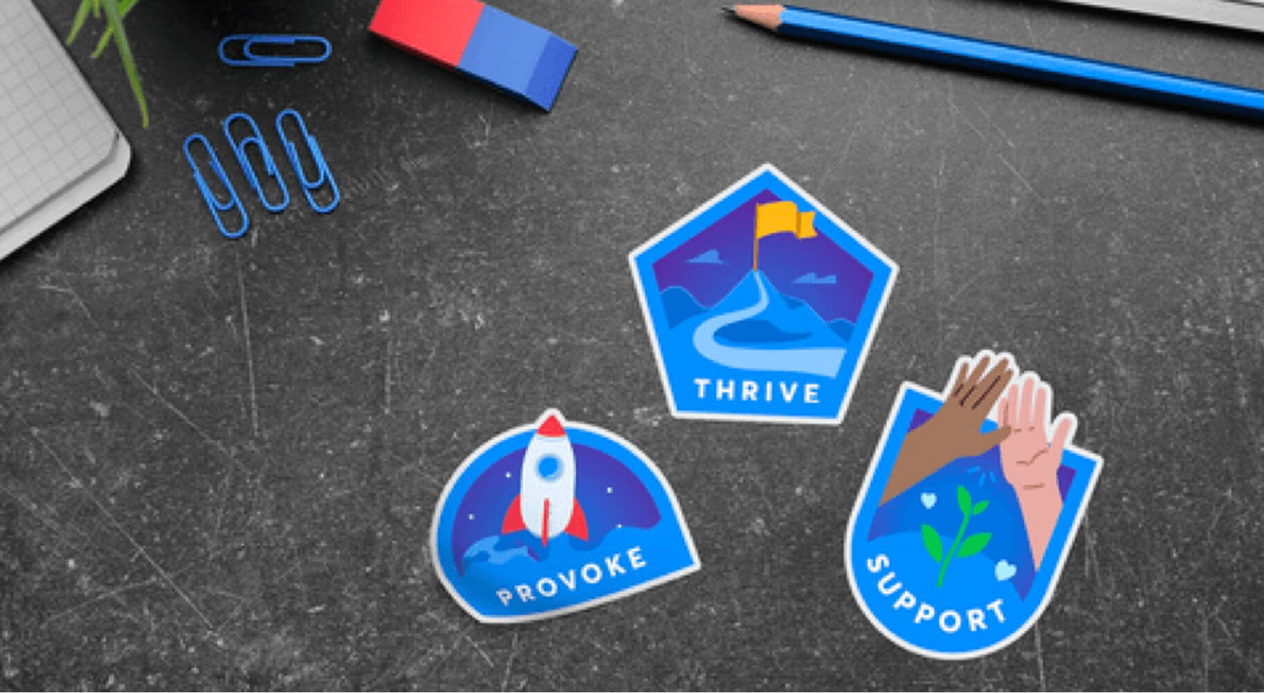 Photo-style image showing stickers on a desktop