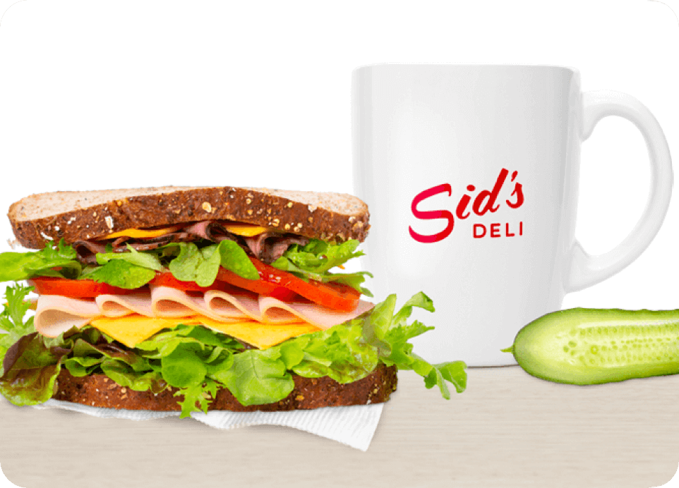 A sandwich with a cup labeled Sid's Deli